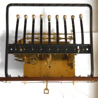 rear view of the frame that holds the 9 tubes in the clock