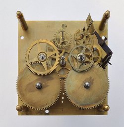 Lenzkirsch clock mechanism with plate removed and gears visible